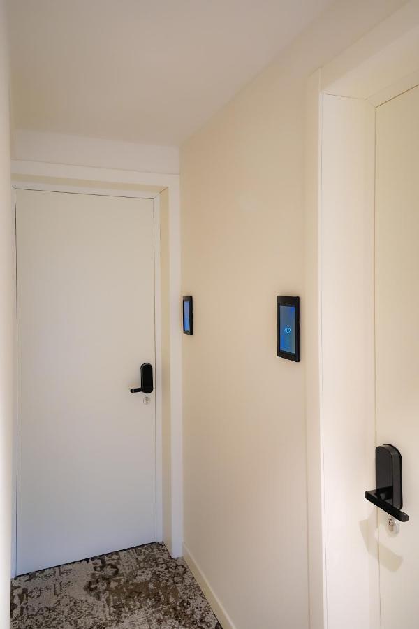 Bergamo Inn 15 Eksteriør bilde A wall mounted tablet